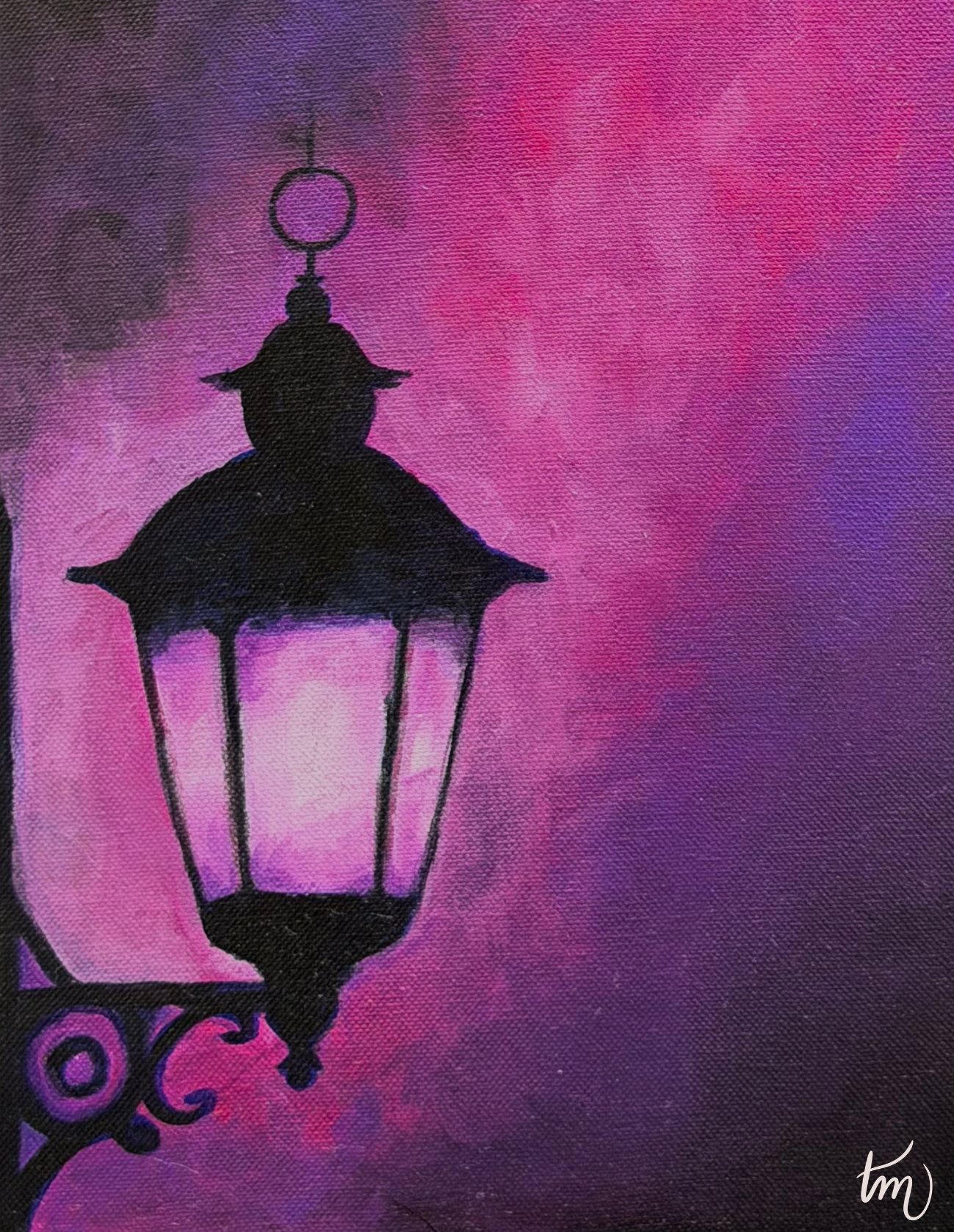 Black lantern silhouette against a pink and purple gradient background